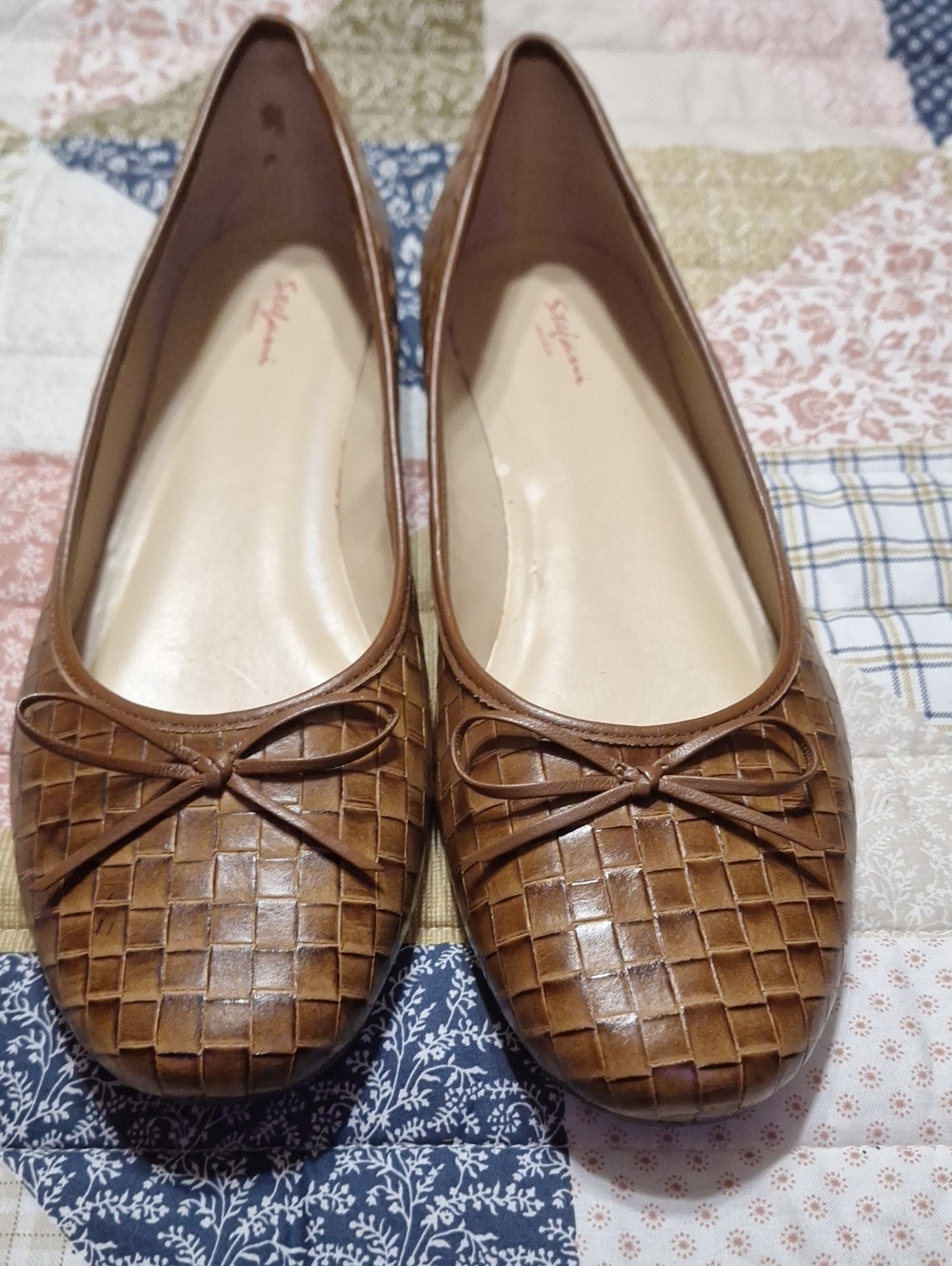 Stephanie Collection’s Tan Woven Ballet Flats with Bow